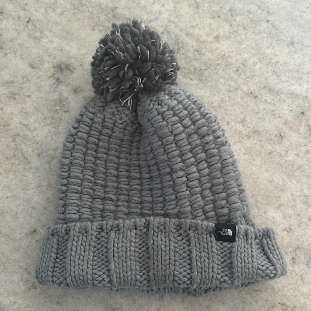 Women’s North Face hat with Pom Pom